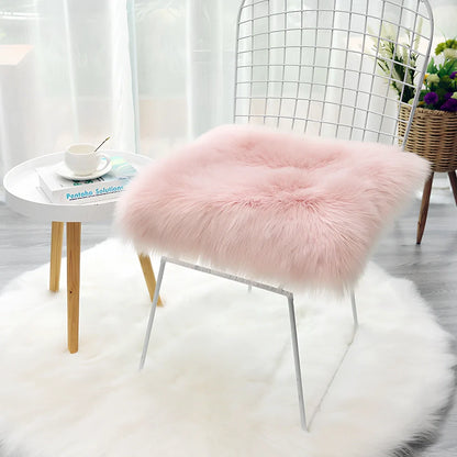 Square office chair cushion with polyester fibre filling on standard desk chair