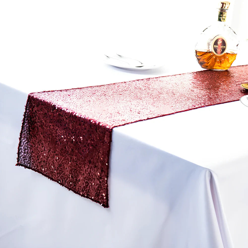 Polyester table runner with Gypsophila embroidery and sequin detailing in beige colour on wooden table