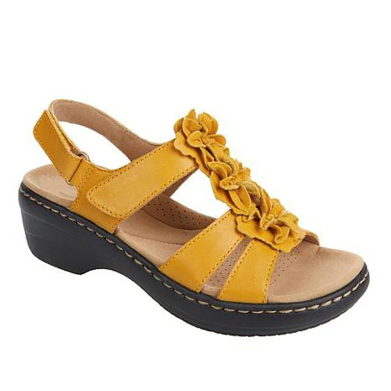 Stylish flower-adorned sandals with comfortable wedge heel in various colors