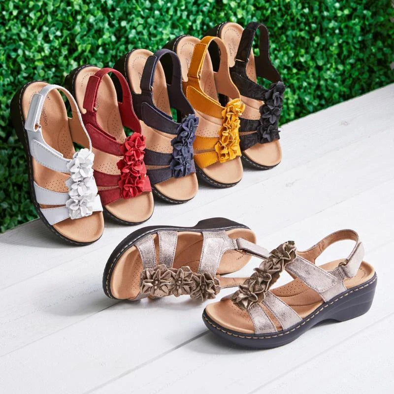 Stylish flower-adorned sandals with comfortable wedge heel in various colors