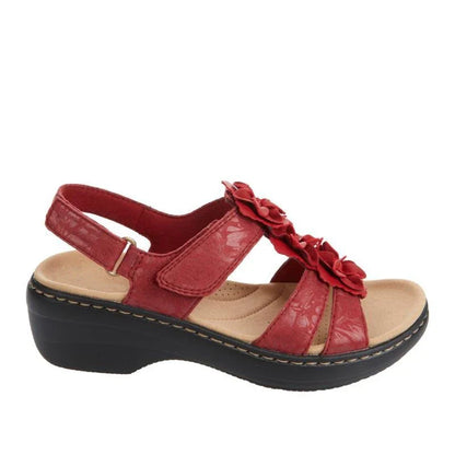 Stylish flower-adorned sandals with comfortable wedge heel in various colors