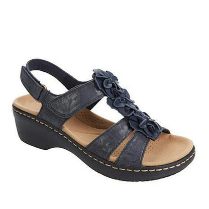 Stylish flower-adorned sandals with comfortable wedge heel in various colors