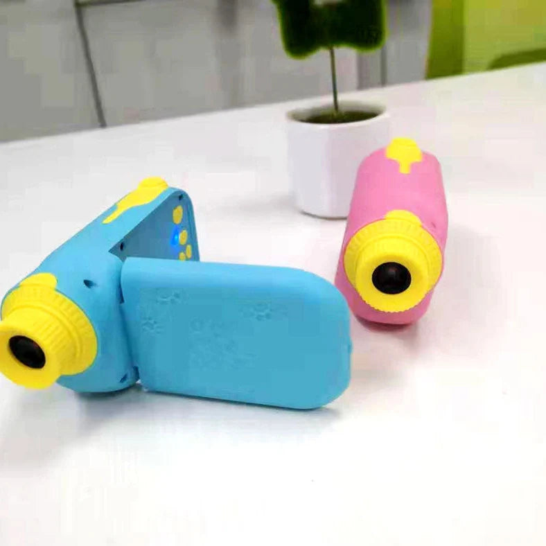 Blue children's DV camera with 2-inch screen, lanyard, and charging cable
