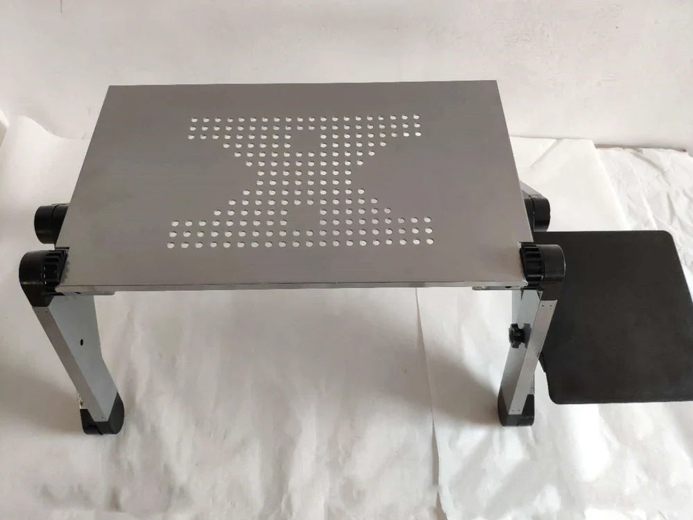 Black aluminium folding computer desk with adjustable legs and non-slip baffles for laptop stability