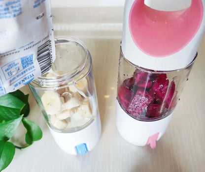 Red electric lemon juicer with round feeding port and manual operation mechanism