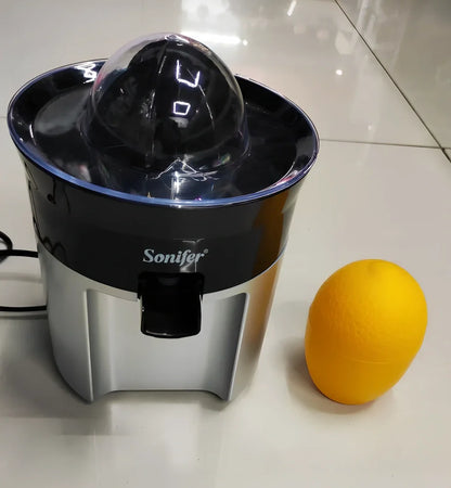 Red electric lemon juicer with round feeding port and manual operation mechanism