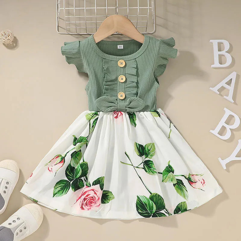 Toddler girl in a sleeveless summer dress, shown in one of six available colours.