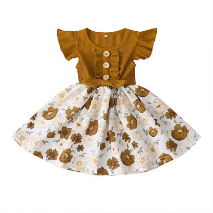 Toddler girl in a sleeveless summer dress, shown in one of six available colours.