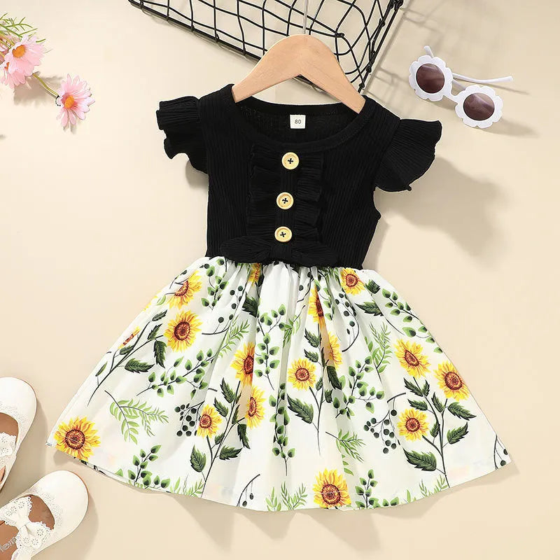 Toddler girl in a sleeveless summer dress, shown in one of six available colours.