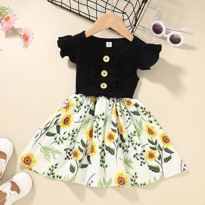 Toddler girl in a sleeveless summer dress, shown in one of six available colours.