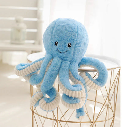 Soft, cuddly plush octopus toy with detailed facial features and flexible tentacles