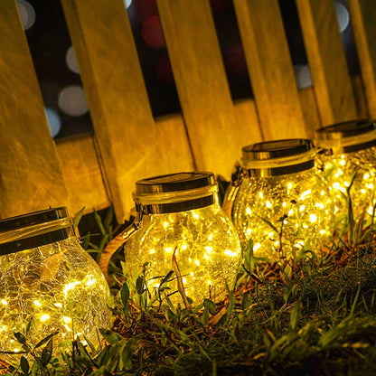 Spherical glass solar LED garden lamp with waterproof design and warm white light