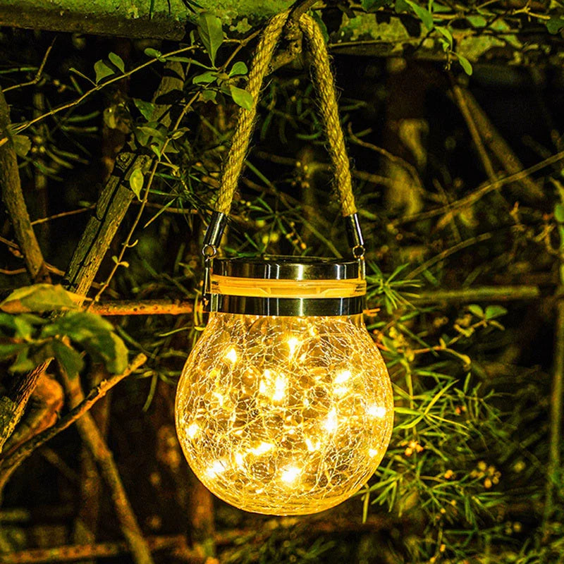 Spherical glass solar LED garden lamp with waterproof design and warm white light