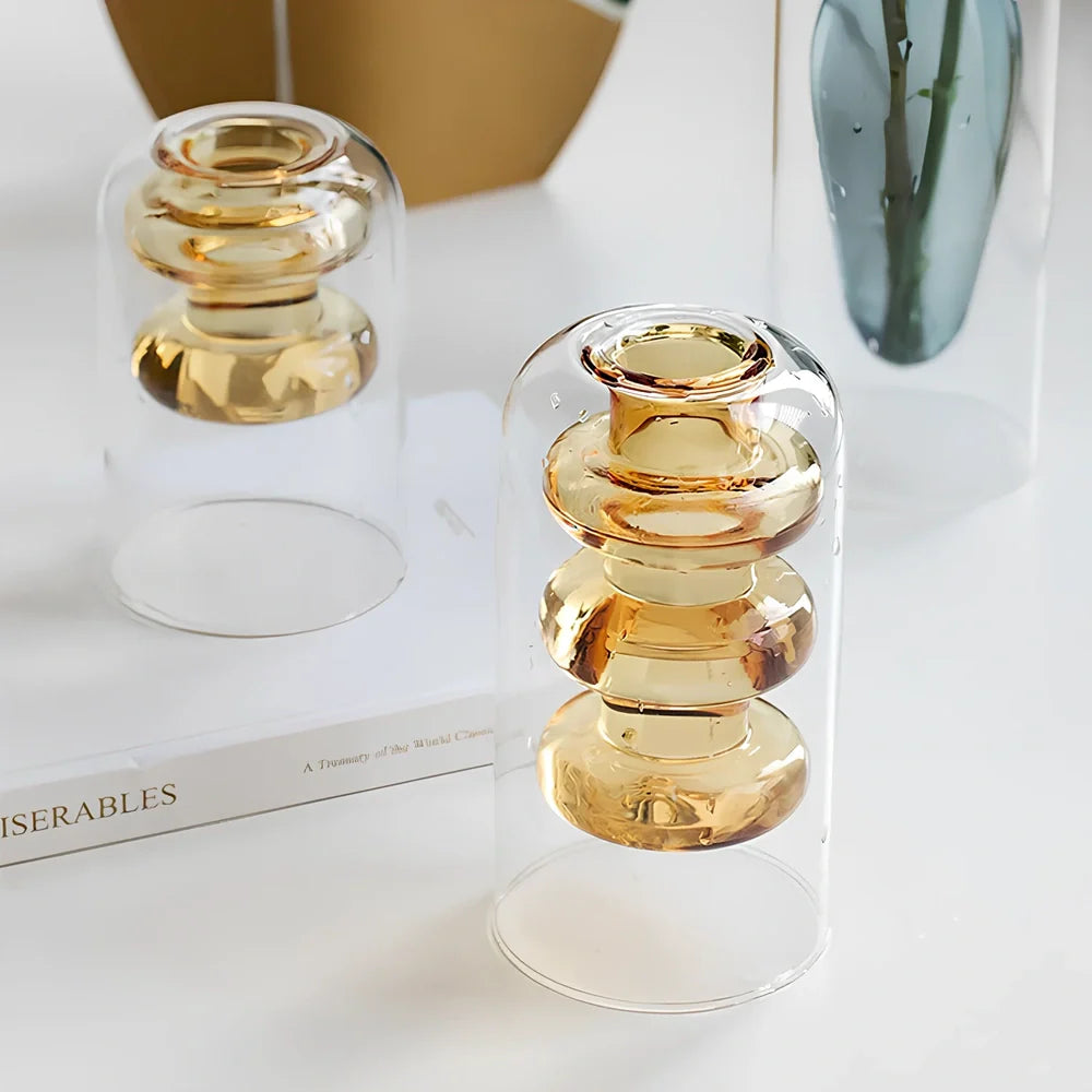 Transparent glass vase with colourful inner layer displaying dried flowers, 15cm tall on wooden table