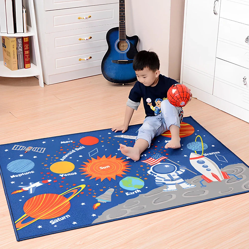 Dark blue rectangular kids carpet with space cartoon pattern measuring 1m by 1.37m