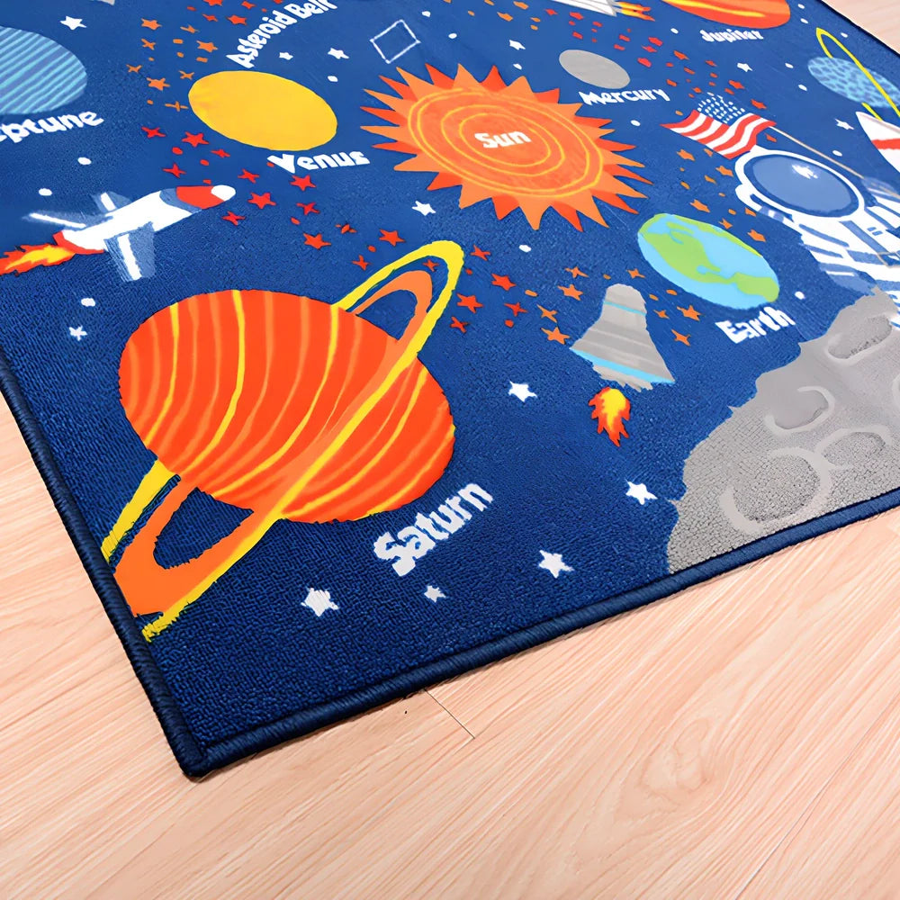 Dark blue rectangular kids carpet with space cartoon pattern measuring 1m by 1.37m