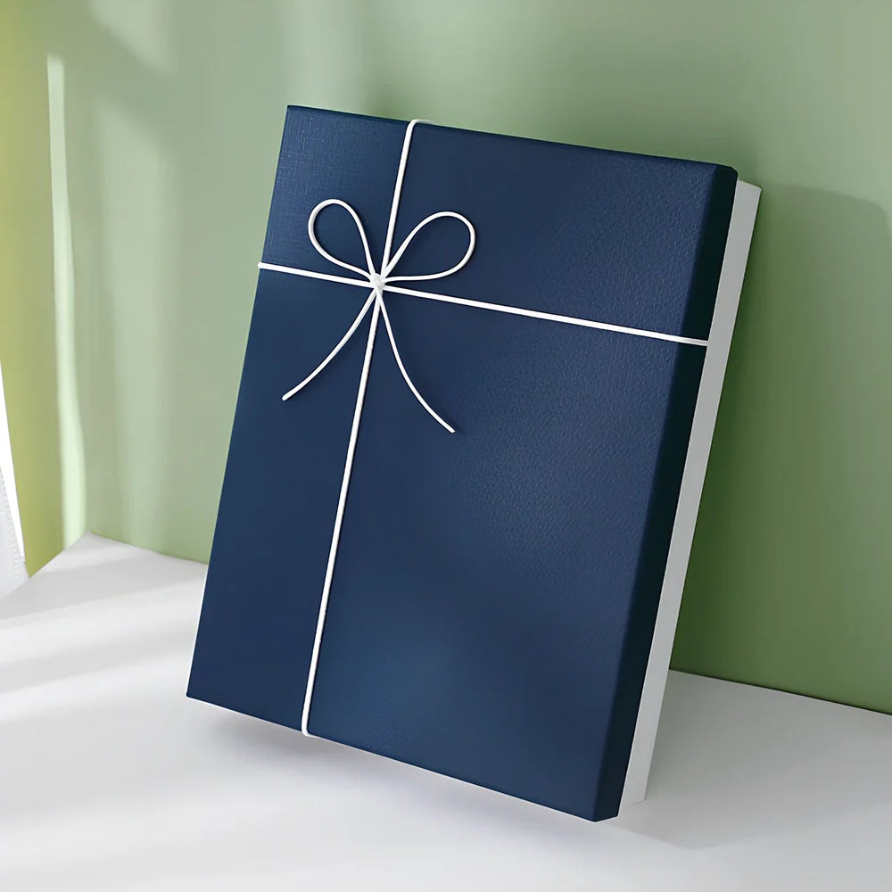 Rectangular gift box showing blue cover with white background, demonstrating thick cardboard construction and clean edges