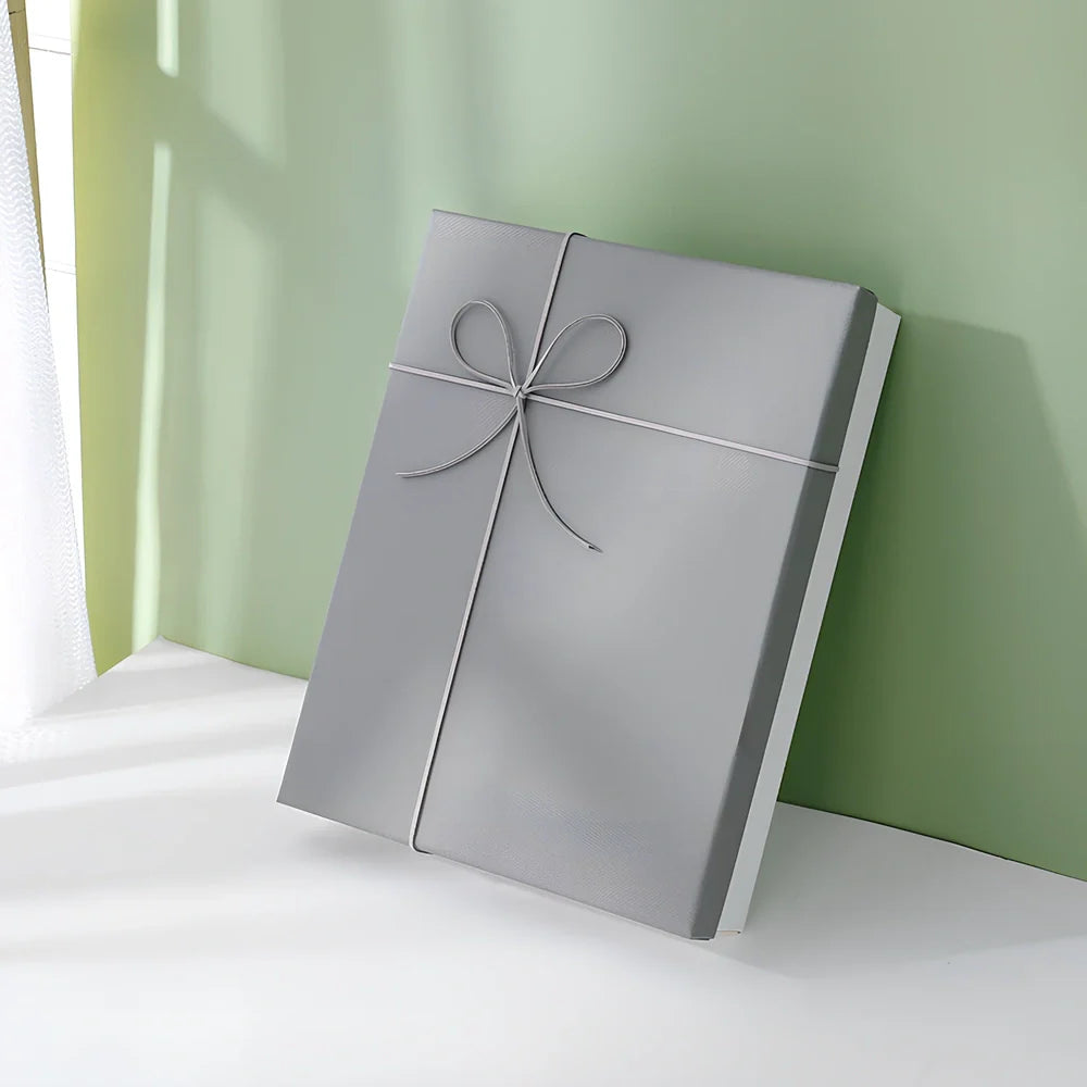Rectangular gift box showing blue cover with white background, demonstrating thick cardboard construction and clean edges