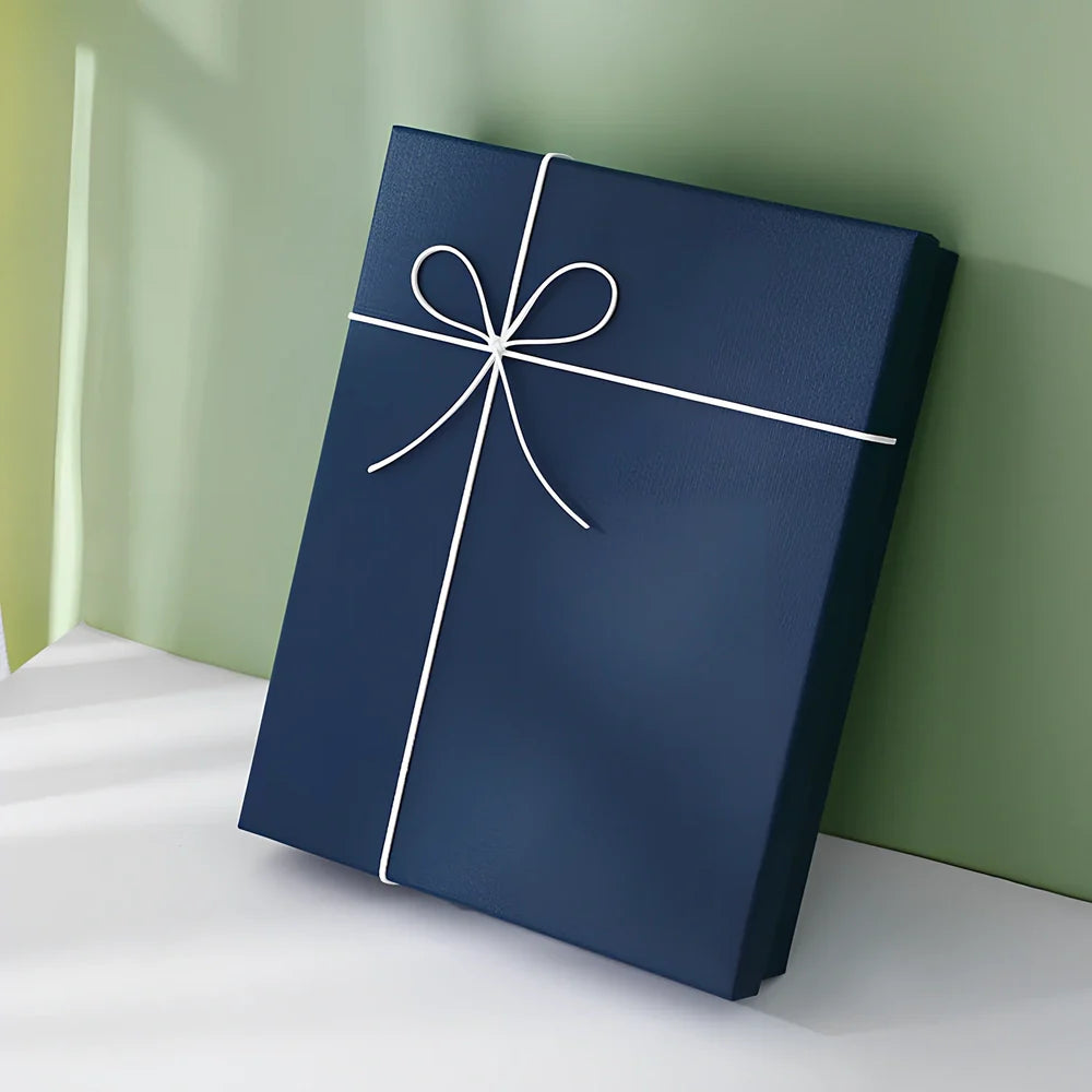Rectangular gift box showing blue cover with white background, demonstrating thick cardboard construction and clean edges