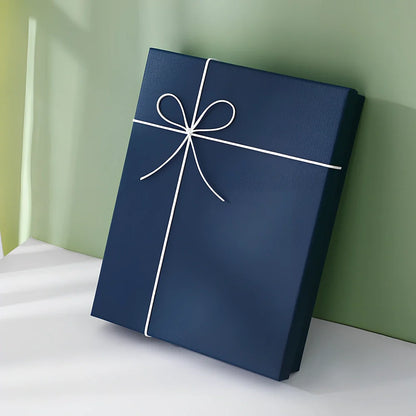 Rectangular gift box showing blue cover with white background, demonstrating thick cardboard construction and clean edges