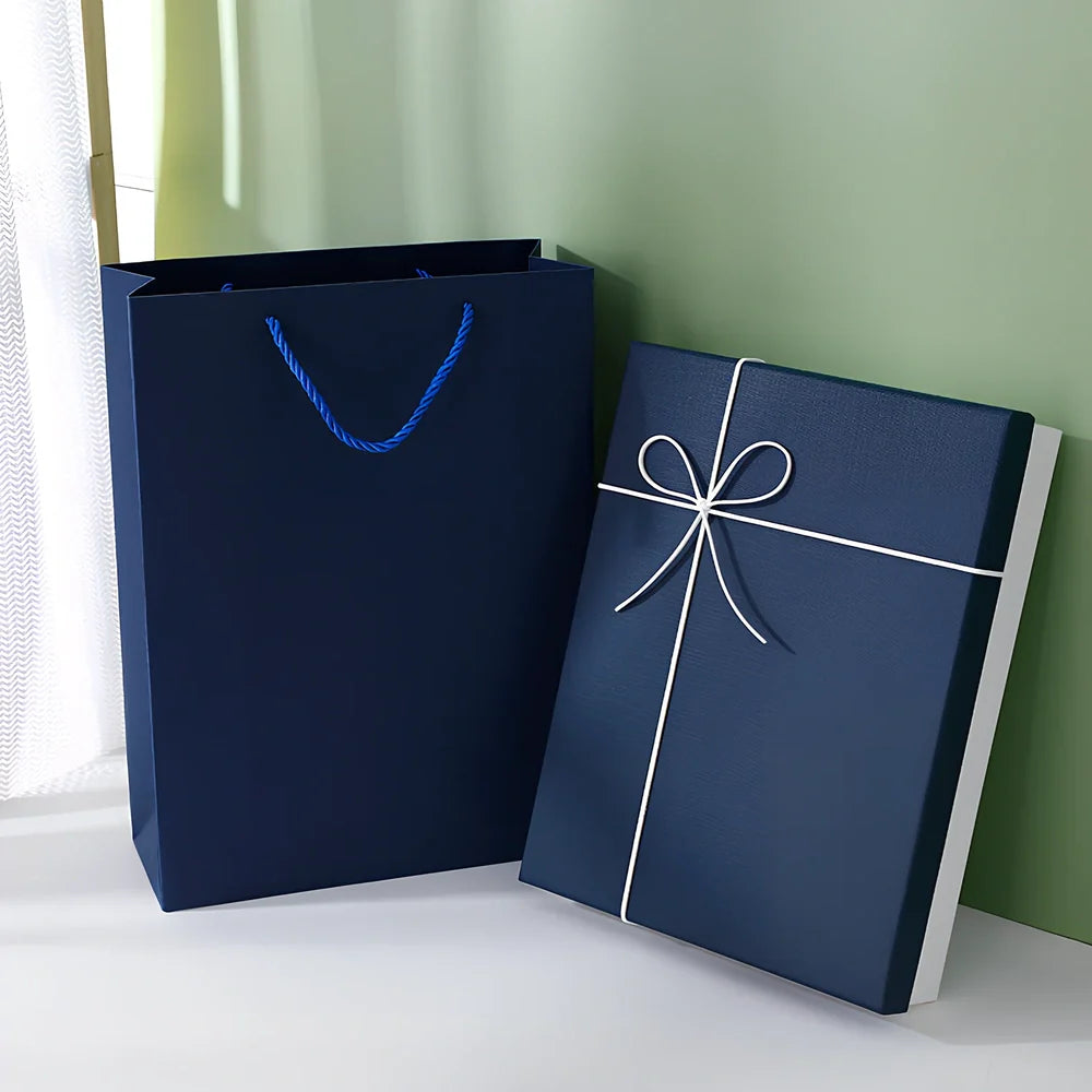 Rectangular gift box showing blue cover with white background, demonstrating thick cardboard construction and clean edges