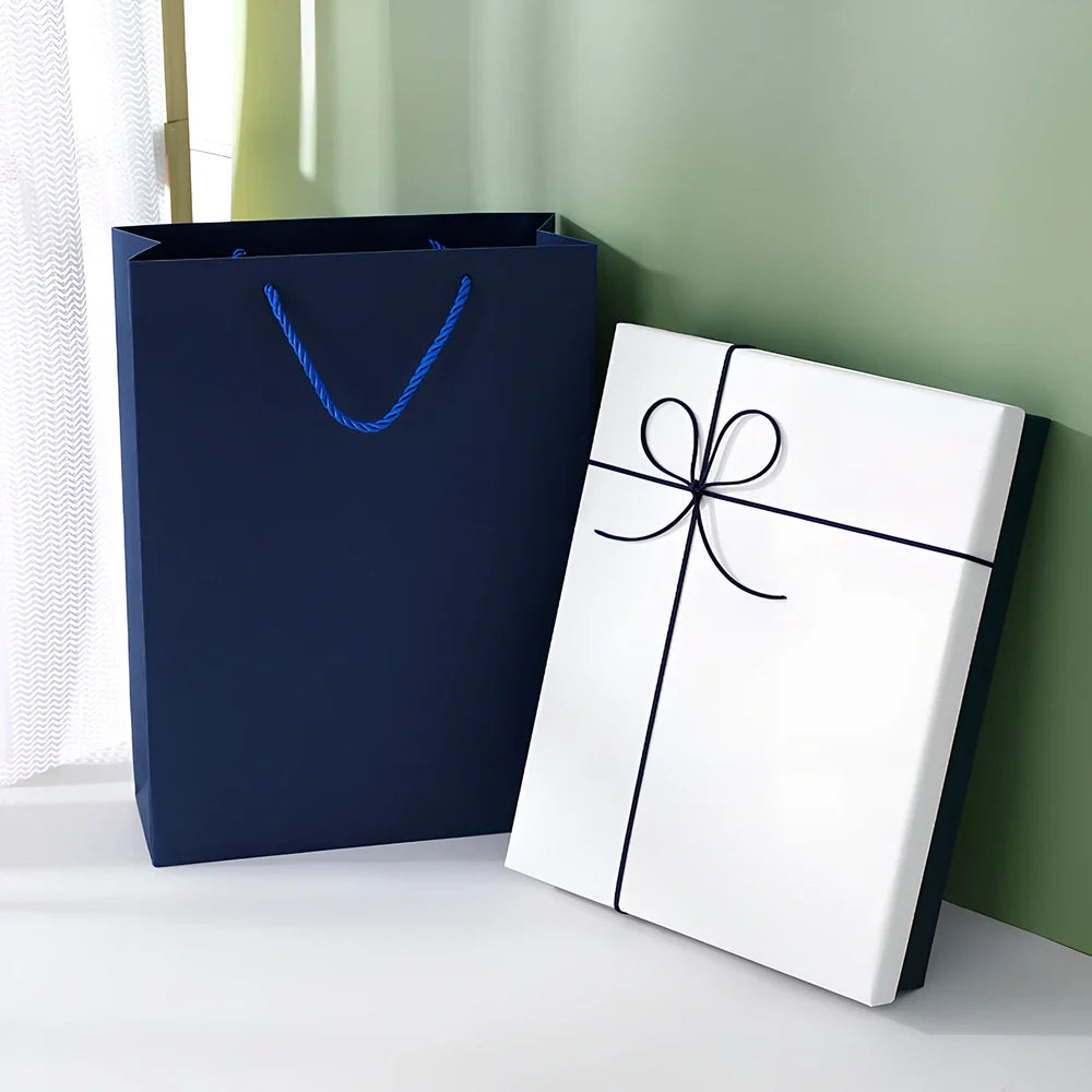 Rectangular gift box showing blue cover with white background, demonstrating thick cardboard construction and clean edges