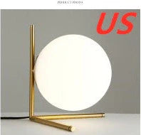 Clear glass spherical table lamp with aluminium base showing dual-colour LED lighting options