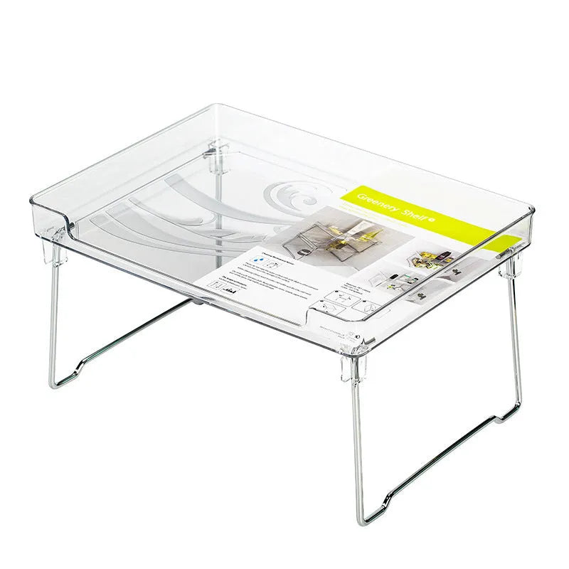 Transparent and white plastic kitchen supplies rack with multiple compartments for drawer and shelf organisation