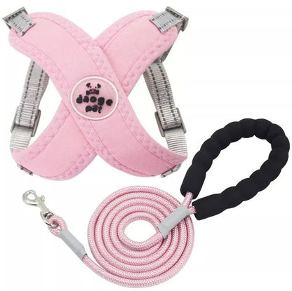 Adjustable pet vest with hand holding rope in blue, green, pink, or yellow colours