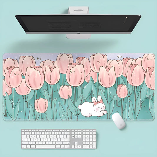 Large floral pattern mouse pad on a wooden desk with a computer mouse.