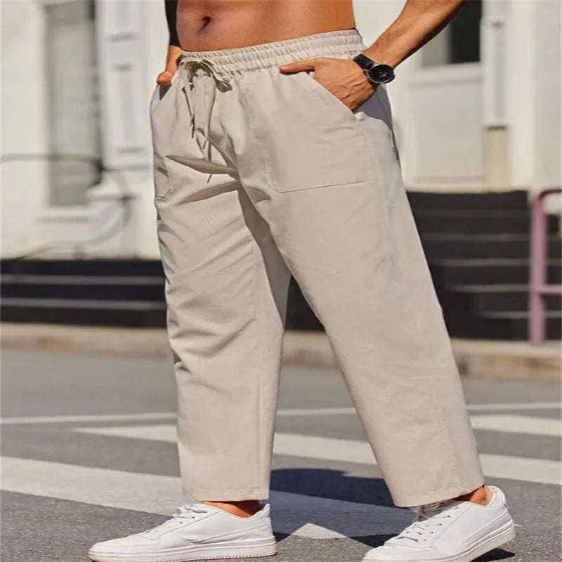 Men's straight-leg linen trousers in apricot colour with elastic waistband