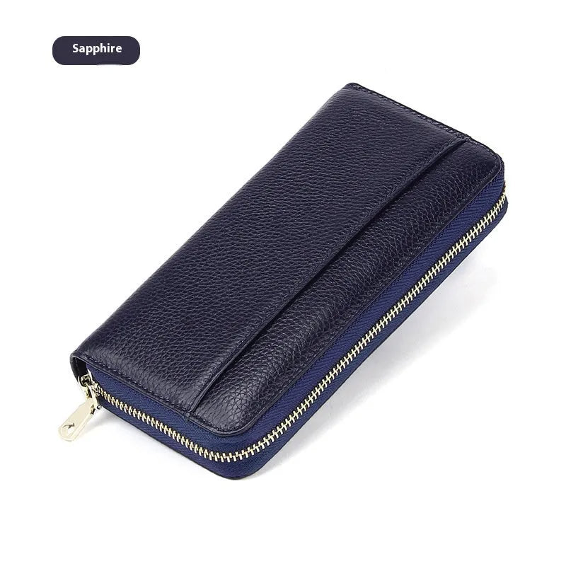 Long genuine leather women's wallet in solid colours with 12 card slots and anti-theft design