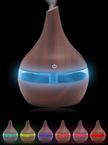 Round wood grain humidifier with USB cable on wooden surface