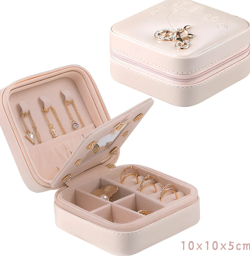 Three-layer travel jewellery box with PU leather exterior and secure closure for organised accessory storage