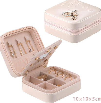 Three-layer travel jewellery box with PU leather exterior and secure closure for organised accessory storage