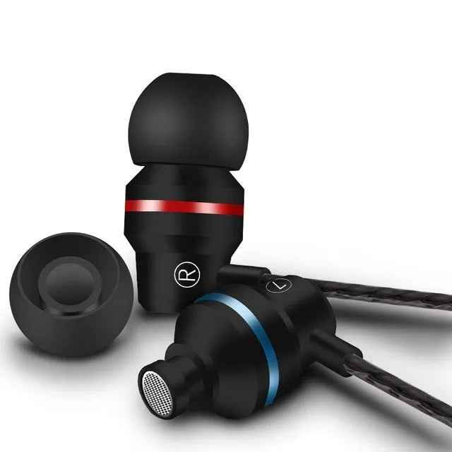 Wired in-ear headphones with microphone in black, showing 3.5mm plug and silicone ear tips.