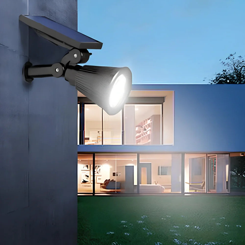 Solar lawn light with ground stake mounting, LED illumination, and waterproof housing for garden installation