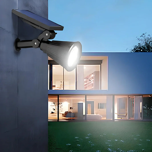 Solar lawn light with ground stake mounting, LED illumination, and waterproof housing for garden installation