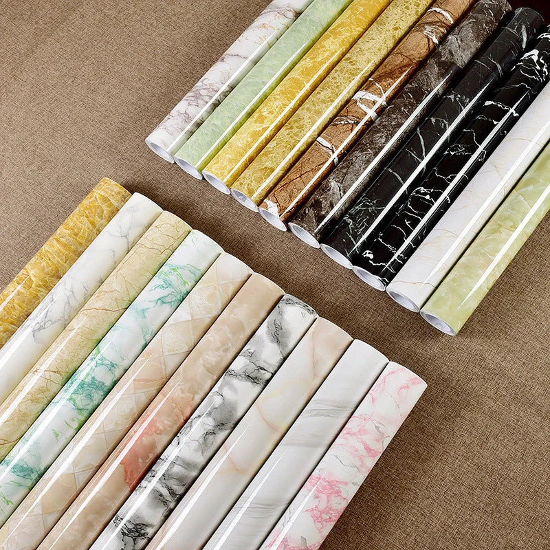 Premium peel-and-stick marble-look wall panels in various colors and sizes for kitchen and bathroom renovations