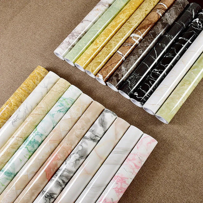 Premium peel-and-stick marble-look wall panels in various colors and sizes for kitchen and bathroom renovations