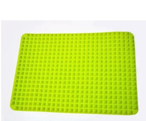 Red silicone pyramid grid cooking mat on a kitchen counter