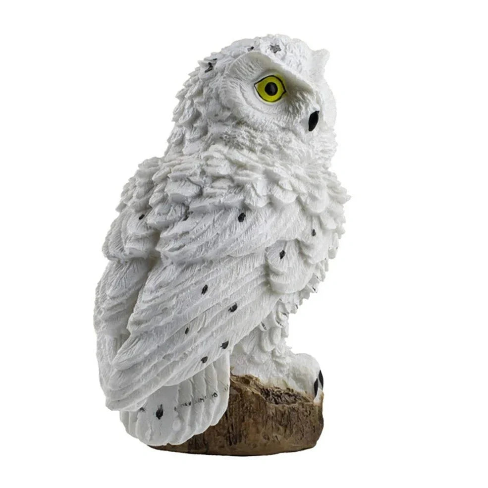 Brown solar owl garden light measuring 45cm height with solar panel on top for outdoor LED illumination