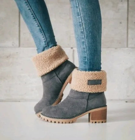 Mid-tube thick heel suede snow boots in black with beef tendon sole and waterproof platform.