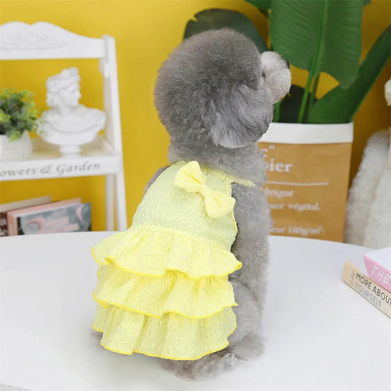 Small dog wearing polyester princess dress with layered skirt in rose red colour