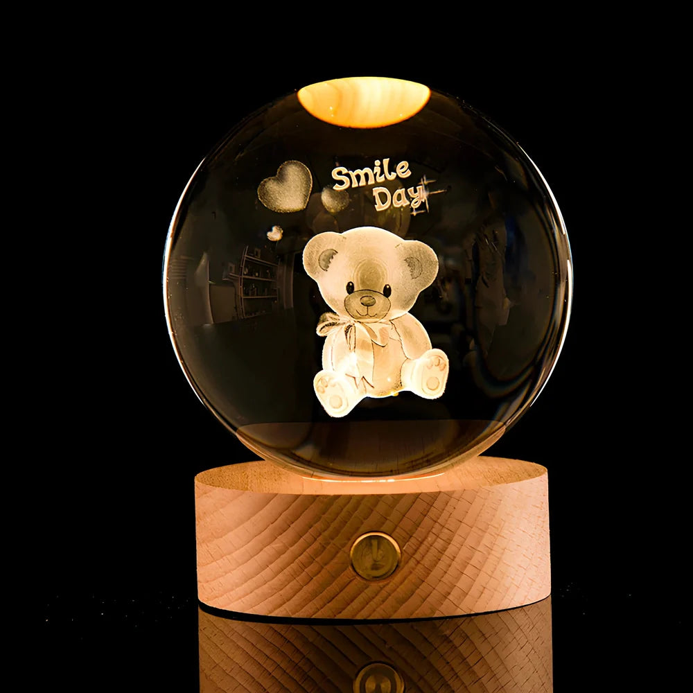 Transparent crystal ball with 3D laser inner carving of galaxy patterns on charging base