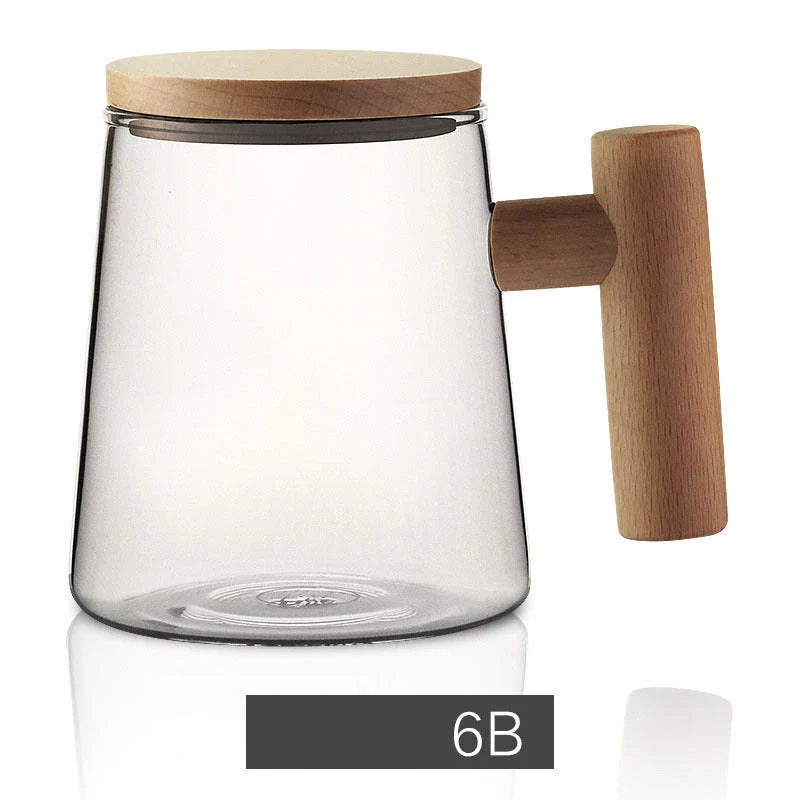 Premium glass tea infuser cup with wooden handle, offering a unique tea-water separation system and temperature-resistant construction for a refined tea experience.