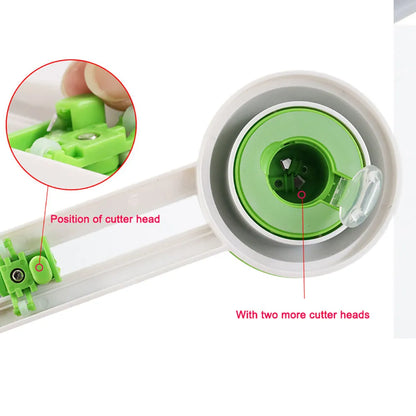 Green and orange plastic round paper cutter for office use, capable of cutting A3 sheets.