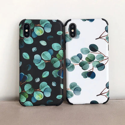 Black silicone iPhone case with a leaf pattern design on the back.