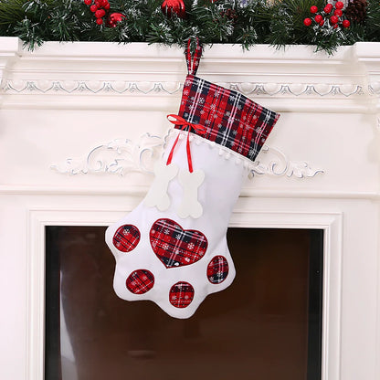 Red dog paw shaped Christmas stocking measuring 20cm by 46cm with reinforced hanging loop