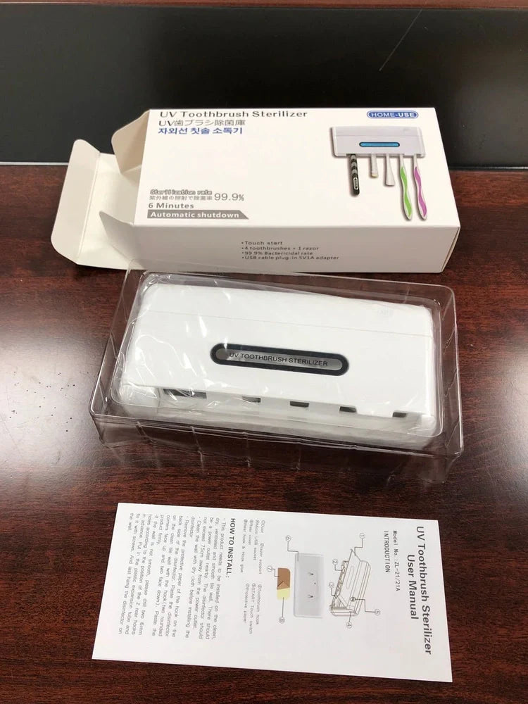 White UV toothbrush sterilisation holder with 253.7nm wavelength disinfection, 157mm width compact design for bathroom counter